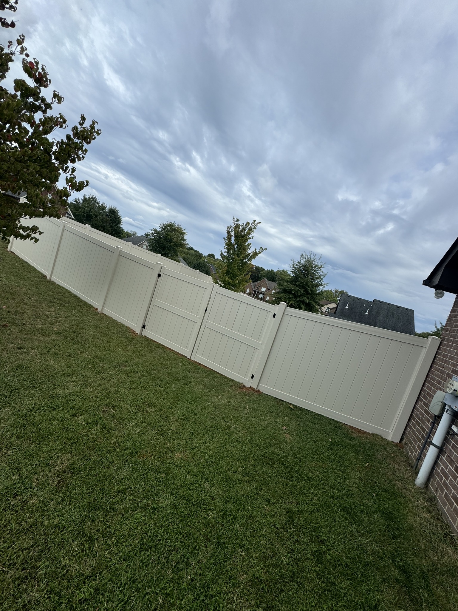 Vinyl privacy fence with double gate