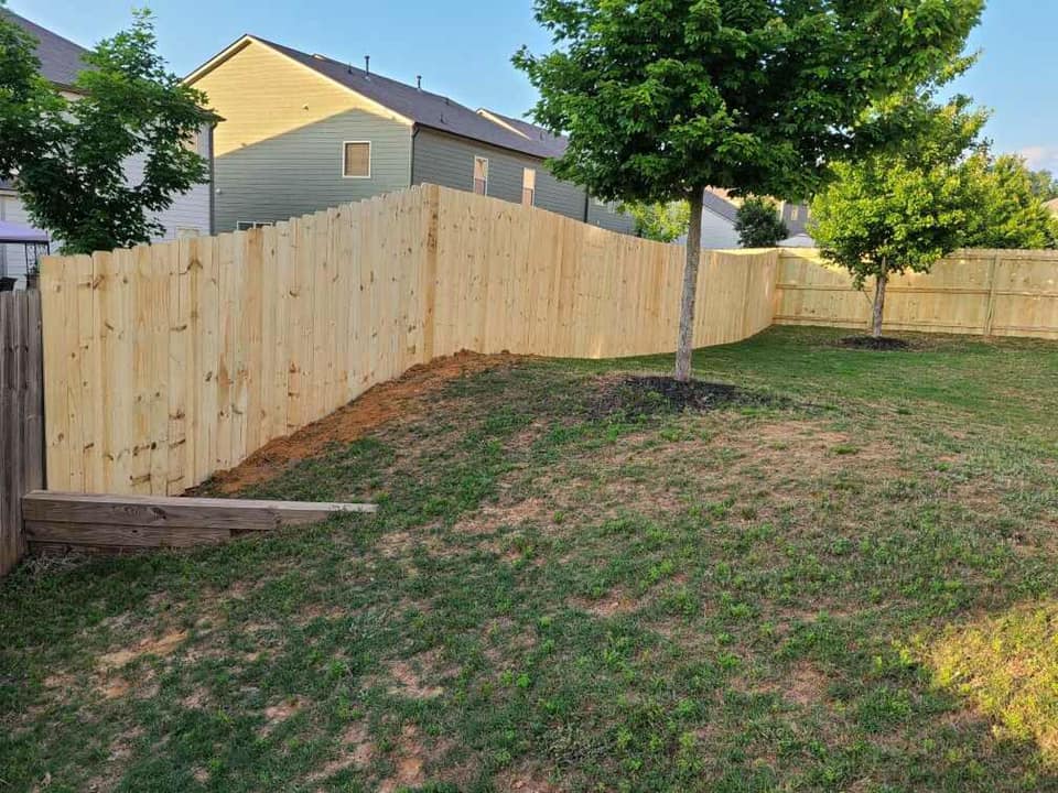 Wood stockade privacy fence